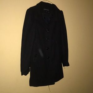 A button coat. Belt to jacket is missing.